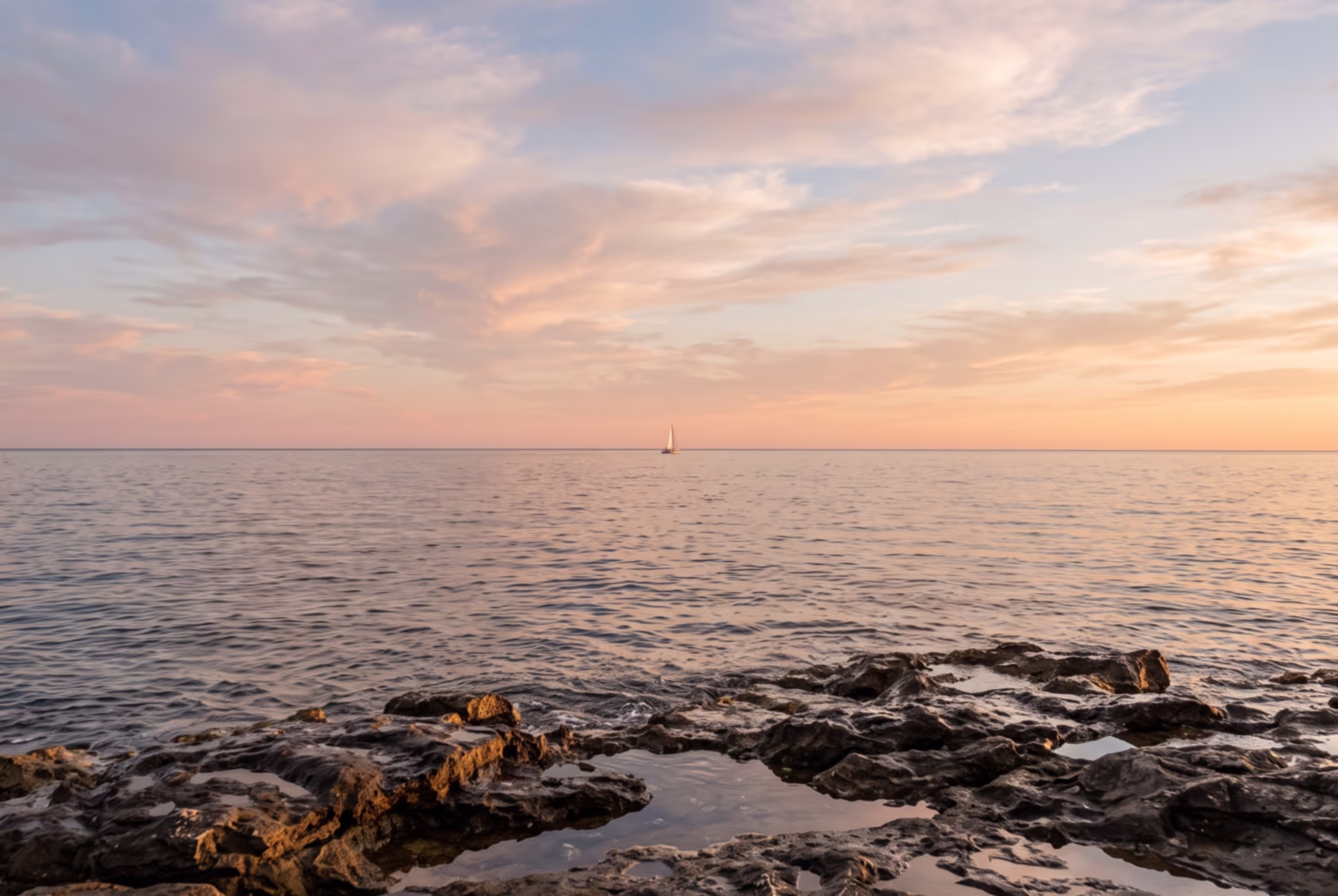 The same photo after Straighten: the horizon is level and the corners are cropped away